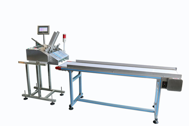 Sheet product stacking machine